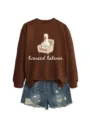 Detailed view of the brown long-sleeve sweatshirt and ripped denim shorts outfit design. - S / Tops / Coffee