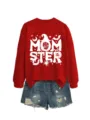 Close-up detail of the red Halloween graphic sweatshirt and ripped denim shorts set. - S / Tops / Bright Red Sweatshirt (White Pattern)