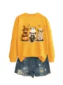 Felpa gialla a maniche lunghe con stampa di mucca delle Highland e pantaloncini di jeans. - Taglia S / Top / Giallo