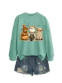 Felpa verde con stampa di mucca Highland Halloween abbinata a pantaloncini di jeans. - Taglia S / Top / Verde chiaro