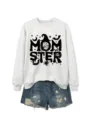 Nahaufnahme Detail des grauen Damen Sweatshirts mit Halloween MOMSTER Grafik und Shorts. - S / Oberteile / Off-White Sweatshirt (Schwarze Grafik)