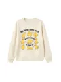 Close-up detail of cute cartoon yellow ducks print on soft beige crewneck sweatshirt - Sand