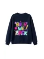 Detail shot of the navy blue sweatshirt featuring playful back to school letter print graphics. - 110 / Tops / Navy Blue