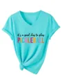 Close-up detail of the cyan V-neck short sleeve t-shirt with pickleball graphic print. - S / Tops / Deep Water Blue