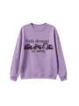 Detail view of a purple crewneck sweatshirt featuring a fun truck and wheels graphic print. - 110 / Tops / Lavender