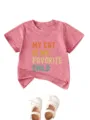 Detailansicht des niedlichen Kinder-T-Shirts mit rosa meliertem Stoff und lustigem Katzen-Text. - Pfirsich