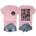 Detail view of the pink short sleeve graphic tee featuring catchy text print on front and back. - S / Tops / Yellow