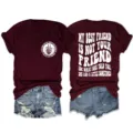 Detailed view of the graphic short sleeve tee, showing bold back slogan and chest print details. - S / Tops / Burgundy