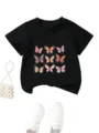 Schwarzes Kinder Kurzarm T-Shirt mit niedlichem Schmetterlings-Grafikprint Design. - 90cm / Oberteile / Schwarz