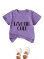 Close-up detail of the purple heather children t-shirt with letter print and matching white shoes. - Purple