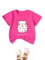 Cute pink kids t-shirt detail showing the sweet white cat graphic and red hearts print close up. - 90cm / Tops / Rose Red