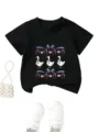 Kids black t-shirt featuring cute three ducks, bows, hearts and floral graphic print details. - 90cm / Tops / Black
