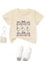 Detailed view of cute kids short sleeve t-shirt featuring sweet duck and floral print. - Apricot