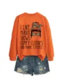 Close-up of casual orange long sleeve sweatshirt with funny text print and denim shorts. - S / Tops / Orange