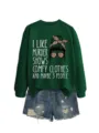 Detailed view of the dark green graphic sweatshirt with funny text and stylish denim shorts. - S / Tops / Dark Green Sweatshirt (White Text Pattern)