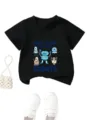 Detail view of black kids short sleeve t-shirt featuring cute blue robot graphic print. - 90cm / Tops / Black