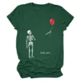 Close-up detail of dark green short sleeve graphic tee featuring funny skeleton and red balloon. - 2XL / Tops / Burgundy