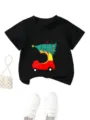 Close up details of kids Christmas tree car graphic crewneck short sleeve t-shirt. - 90cm / Tops / Black