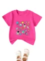 Detail view of kids pink short sleeve t-shirt featuring cute space astronaut and planet print. - Tops / 90cm / Rose Red