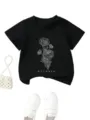 Children's black t-shirt detail featuring floral line art and october graphic print. - 90cm / Tops / Black