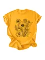Maglietta gialla da donna con stampa di bouquet floreale nero, maniche corte e collo rotondo. - Taglia S / Top / Giallo