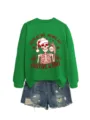 Vista detallada de la sudadera verde con estampado gráfico de esqueleto navideño. - S / Tops / Verde