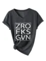 Detail of women short sleeve V-neck t-shirt in dark grey with graphic print and knot hem. - Dark Grey (White Print)