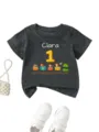 Dettaglio della maglietta grigia per bambini con nome Clara e trenino di animali. - 90cm / Top / Grigio scuro