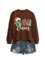Brown sweatshirt detail featuring Nana Claus Christmas print, festive polka dot and leopard design. - S / Tops / Coffee