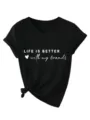 Zwarte V-hals dames t-shirt korte mouw met geknoopte zoom en inspirerende print. - S / Tops / Zwart
