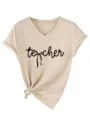 Casual beige V-neck women short sleeve t-shirt detail showing chest graphic and knot hem. - S / Tops / Sand