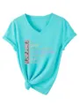 Detailed view of turquoise women V-neck short sleeve t-shirt with nurse graphic print. - S / Tops / Deep Water Blue