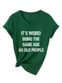 Λεπτομέρεια πράσινου T-shirt με V λαιμόκοψη, αστείο τύπωμα, κοντά μανίκια και κόμπο. - Vintage Πράσινο