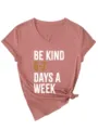 Casual women's V-neck short sleeve t-shirt with graphic slogan print and stylish tied hem detail. - S / Tops / Rose Gold (White Graphic)