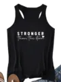 Detail view of casual black women racerback tank top featuring inspiring white text print. - S / Tops / Black