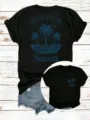 Damen schwarzes Kurzarm T-Shirt lässig lose Palmen Sonnenuntergang Grafik Oberteil - Oberteile / Schwarz / S