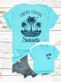 Detailansicht Damen lässiges Grafik T-Shirt mit Palmen Sonnenuntergang Druck Rundhals blau. - Cyan