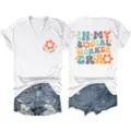 Wit V-hals korte mouw T-shirt met social worker grafische print en denim shorts. - S / Tops / Wit