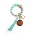Silicone beaded keychain bracelet with wood bead tassel and engraved MAMA pendant for gifts. - Mint Green