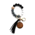 Silicone beaded wristlet keychain with wooden charm and black tassel for women keys. - Black