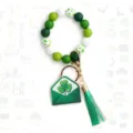 St. Patrick's Day wooden bead keychain bracelet with green shamrock envelope pendant and tassel. - Irish Festival Style 8