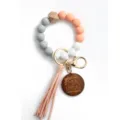 Silikon Perlen Armband Schlüsselanhänger mit Quaste und MAMA Holzanhänger für Muttertag. - Pfirsich