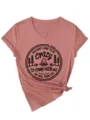Close-up detail of the stylish V-neck short sleeve t-shirt with side knot and camping print. - S / Tops / 3812-Rose Gold (Black Font)