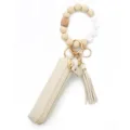 Silicone bead bracelet keychain with PU leather pouch and tassel, stylish handbag accessory. - Off White