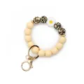 Silicone bead keychain bracelet with cute daisy flower and leopard print charms for women. - Amber White