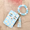 Floral print cardholder wallet with silicone bead wristlet strap and tassel decor. - Sky Blue (Daisy)