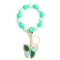 Llavero pulsera de cuentas de silicona coloridas con diamantes y bonito colgante de mariposa. - Verde