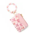 Rosa Leder Kartenetui Brieftasche mit Silikonperlen Armband Schlüsselanhänger Schleifenmuster. - Rosa Schleifen-Druck