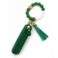 Green silicone beaded wristlet keychain with leather pouch and tassel pendant for women - Dark Green