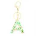 Christmas letter A resin keychain with colorful holiday elements, cute gold metal key ring. - Letter + 8-shaped Buckle / Letter A